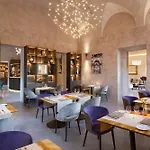 מלון Grand Universe Lucca, Autograph Collection 4*